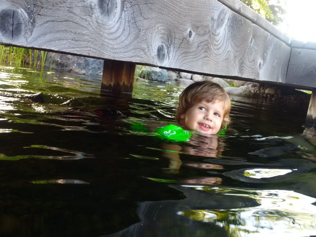 Fun in a natural swimming pond